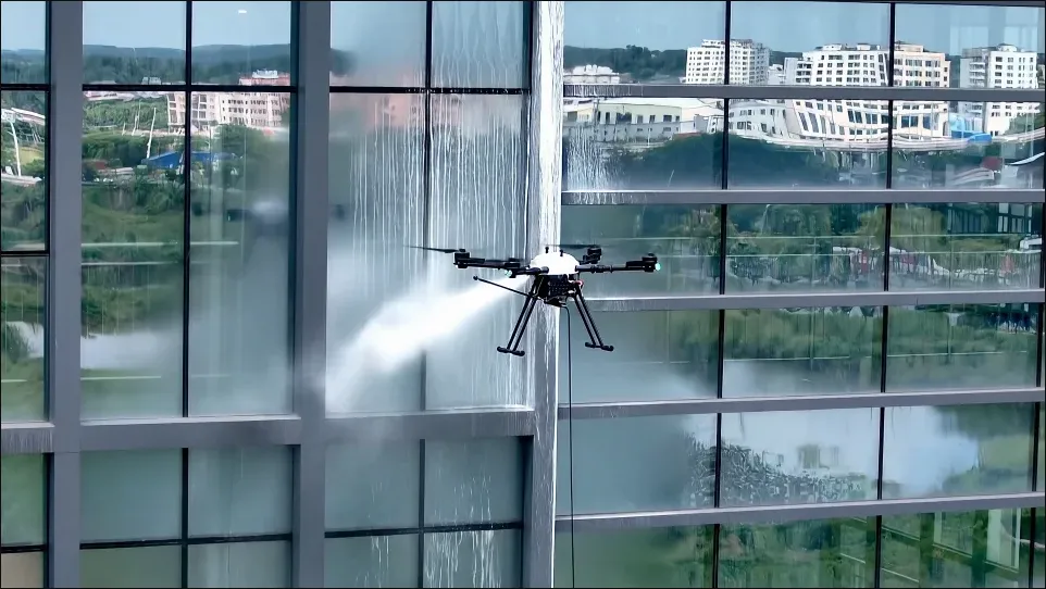 Industrial drone exterior cleaning of high-rise building facade — Drones City drone washing service