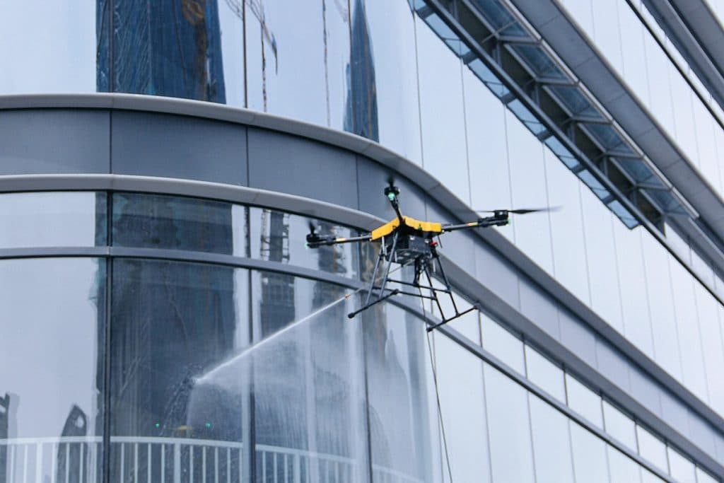 Drone high-rise window cleaning commercial building Los Angeles — Drones City